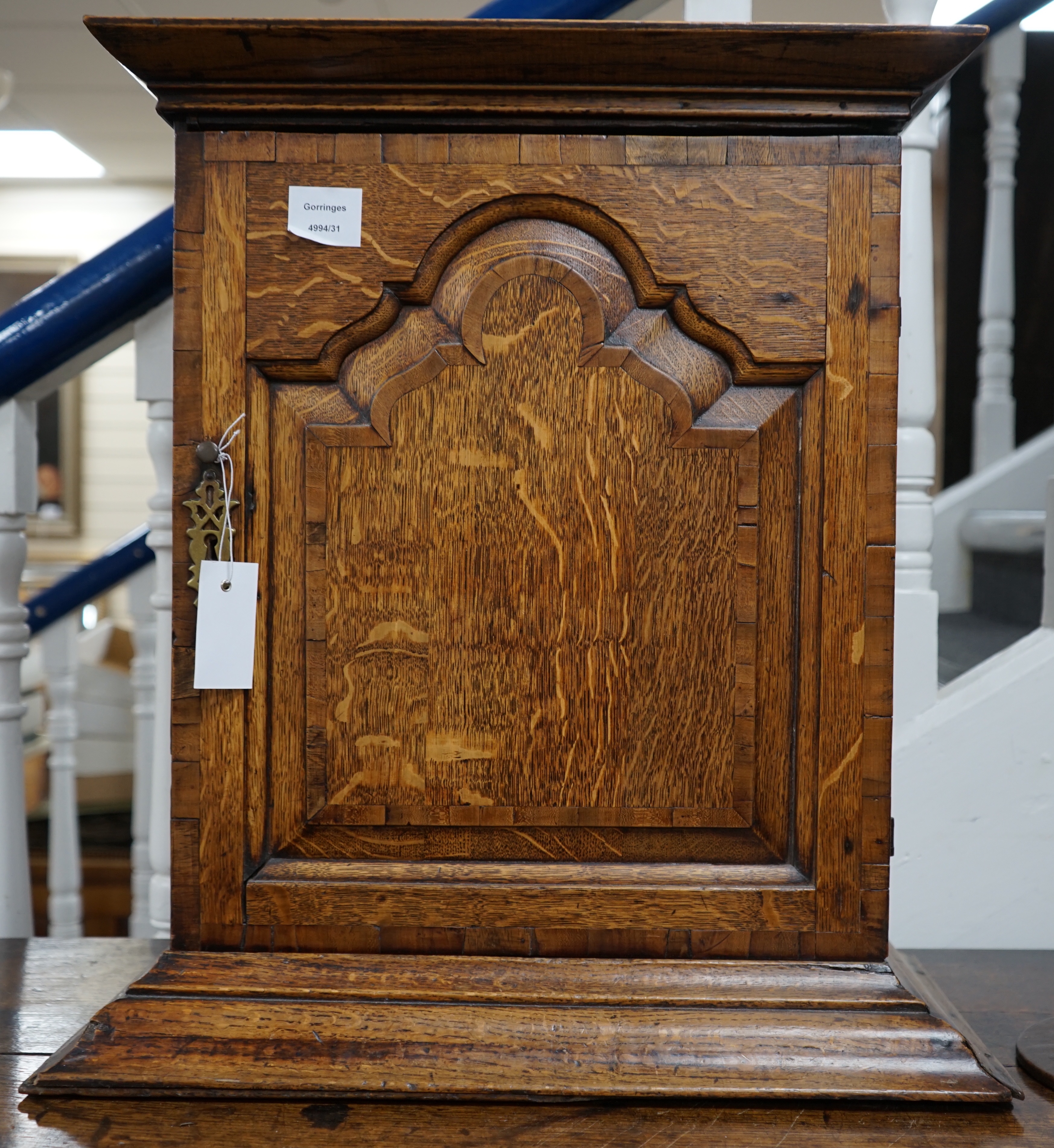 A18th century banded oak spice cupboard, with concealed drawer, width 53cm depth 29cm height 57cm